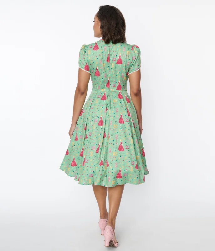 Unique Vintage 1940s Sage & Retro Sewing Print Dahlia Swing Dress